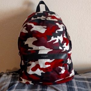 Like new Michael Kors camo backpack